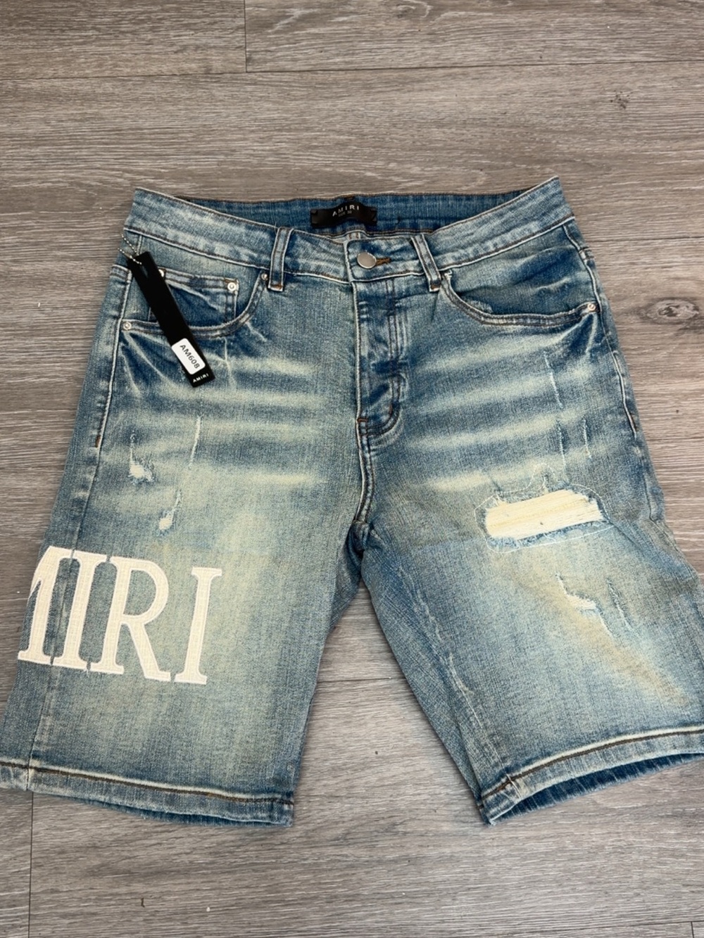 Men's Distressed Light Blue Denim Shorts Amiri